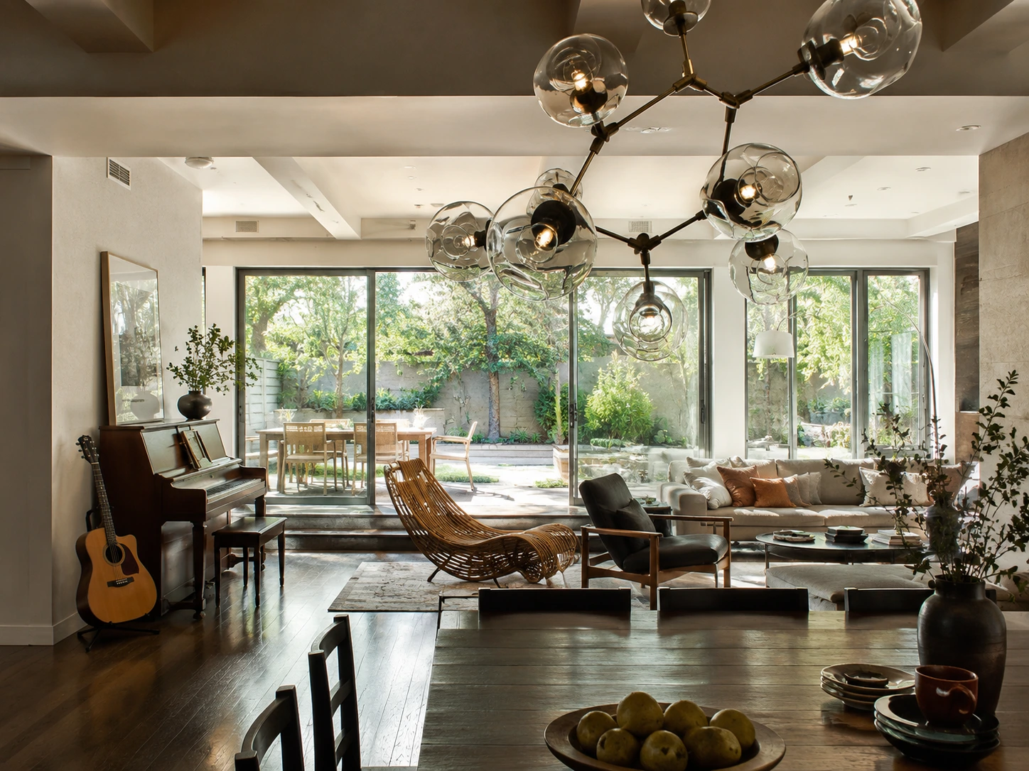 A well-planned modern living room demonstrating calculated sofa-to-television distance, proportional furniture scale, and clear traffic pathways